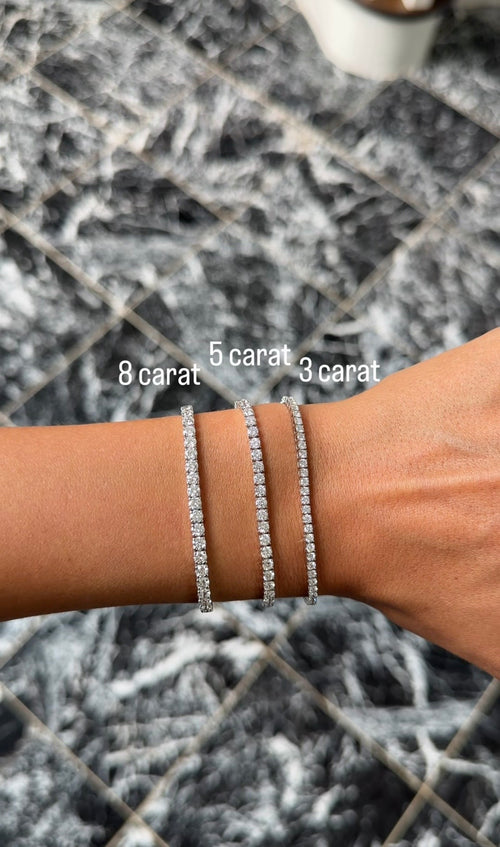 Diamond tennis bracelet in 14k white gold, unbroken line setting, from The Carat Co.
