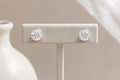 Round diamond stud earrings in a martini setting, from The Carat Co.